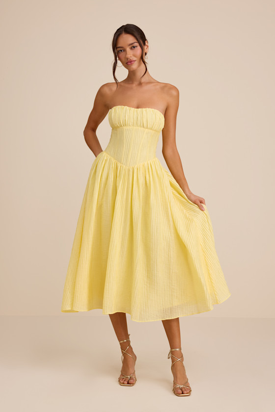 Image of Aspen Pale Yellow Plisse Strapless Bustier Midi Dress