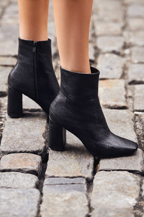 black snake print heeled boots