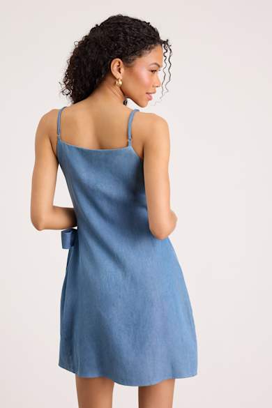 green emerald velvet dress Rylie White Denim Strapless Fringe Mini Dress main image 0
