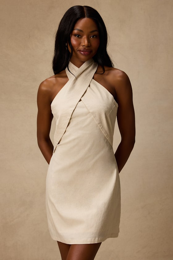 tan short dress Charvi Mini The Dela Dress is made from a natural cotton fabric in a sandy beige hue Short Beige Dresses - Beige