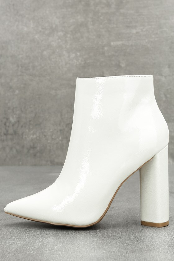 white patent leather ankle boots