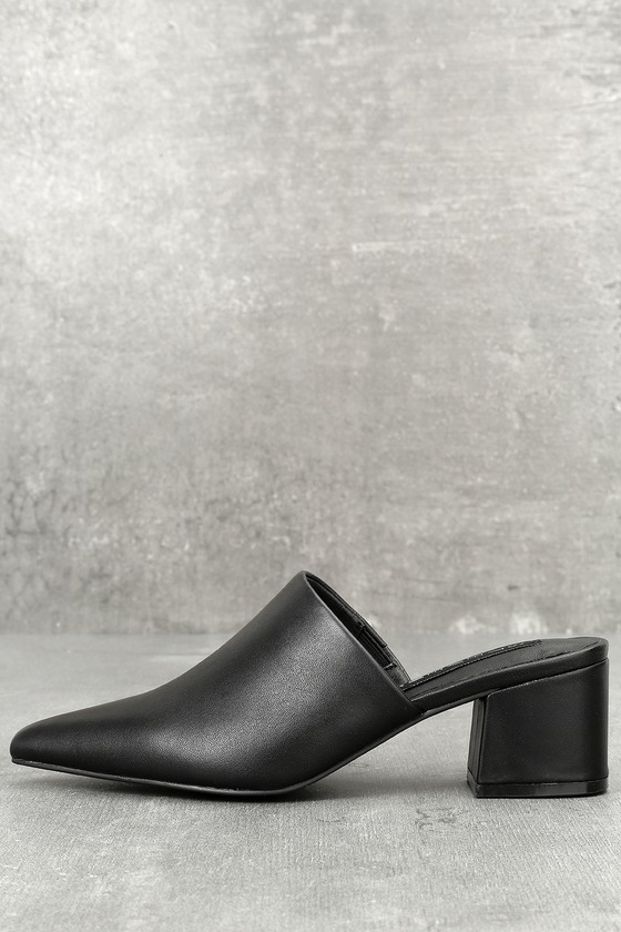 black leather pointed toe mules