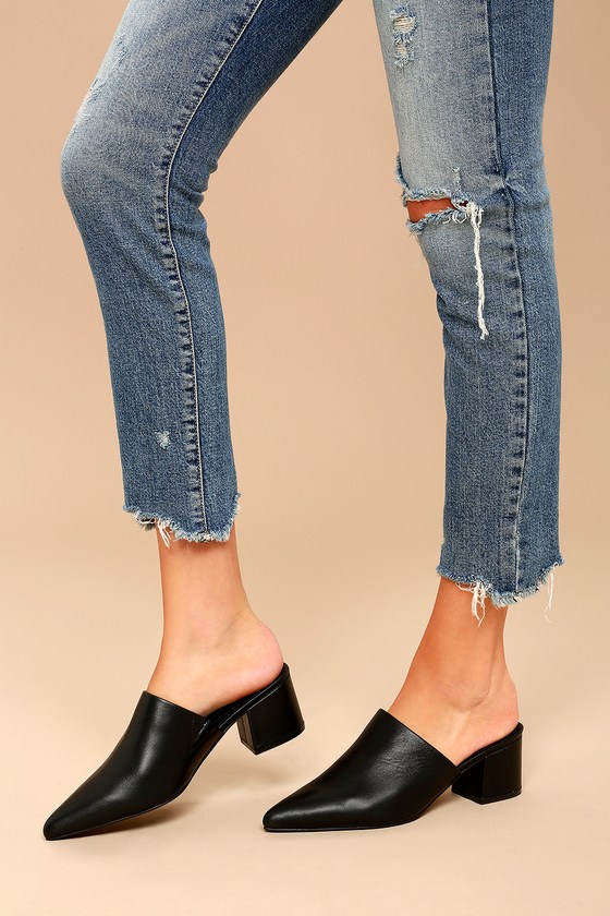 black leather pointed toe mules