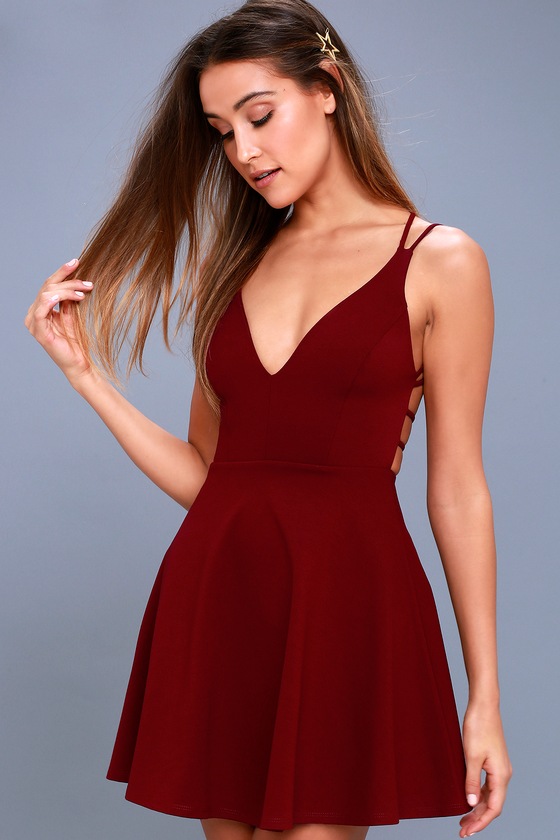 Believe in Love Wine Red Backless Skater Dress - Lulus Exclusive! The Lulus Believe in Love Wine Red Backless Skater Dress will make a romantic out of you! Medium-weight stretch knit shapes a princess-seamed bodice, with a plunging neckline, and strappy, open back. Fitted waist flares into a flirty skater skirt. Hidden back zipper.