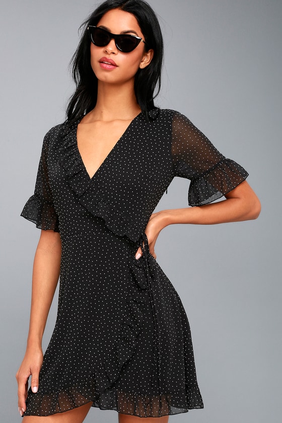 white wrap dress with black polka dots