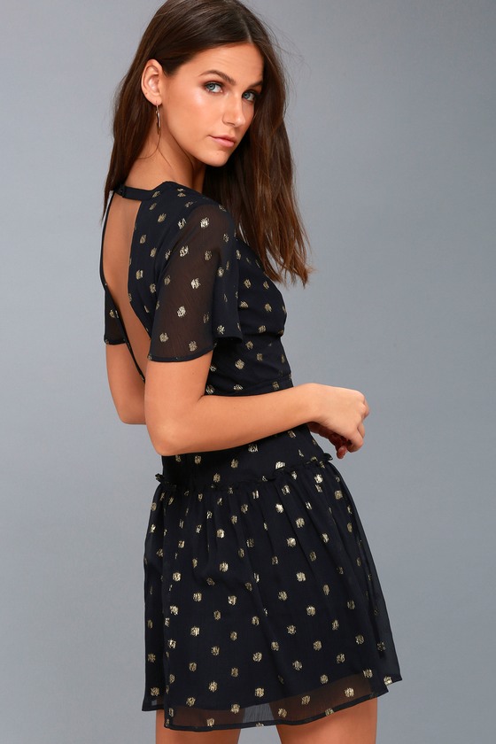 black dress with gold polka dots