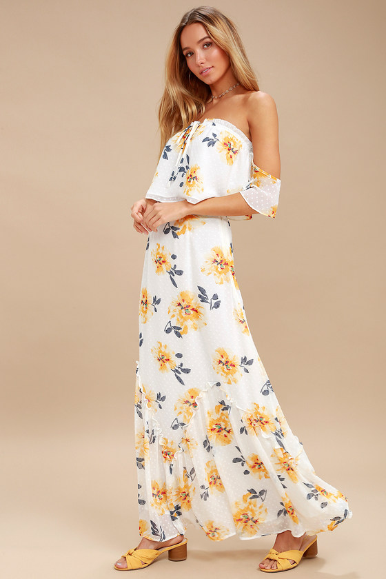 white maxi dress with yellow flowers