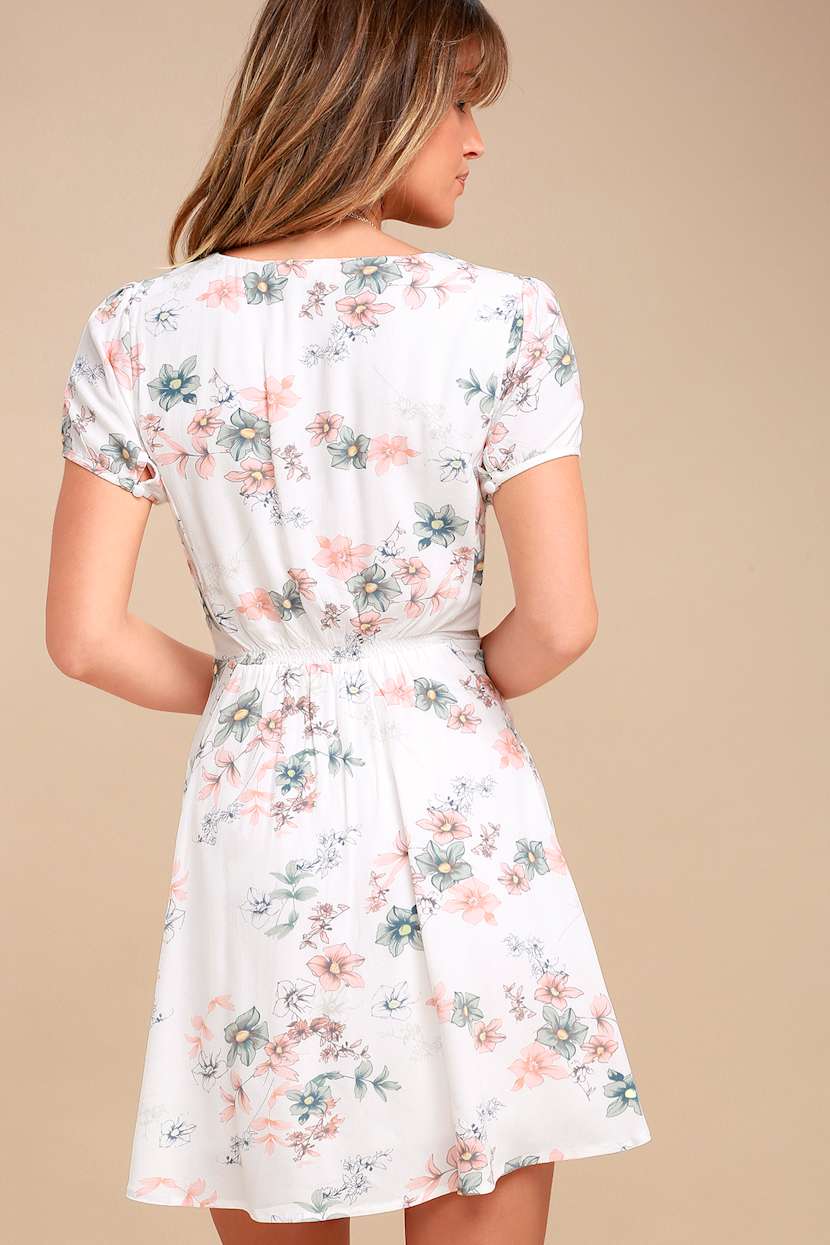 white floral skater dress Emerald Sundae Strappy Back Eyelash Floral Skater Dress at Dry Goods