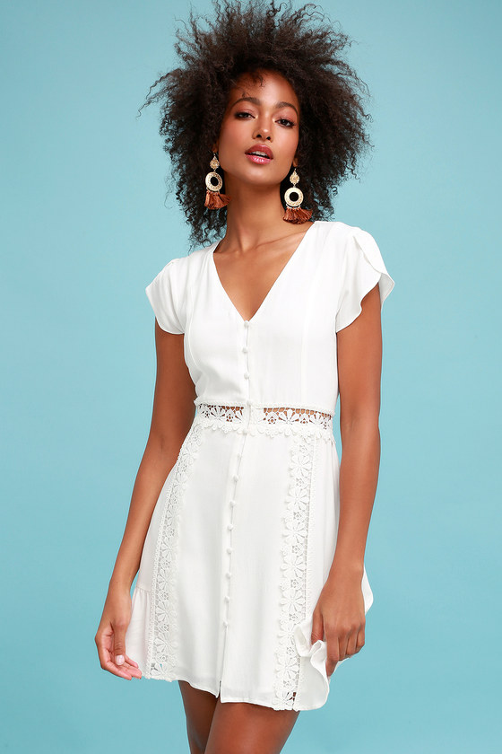 white crochet dress with sleeves