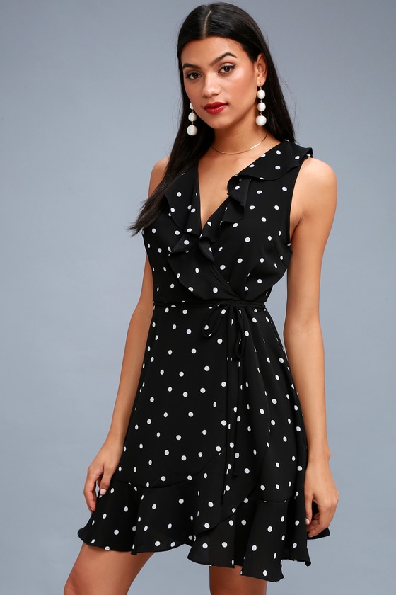 white wrap dress with black polka dots