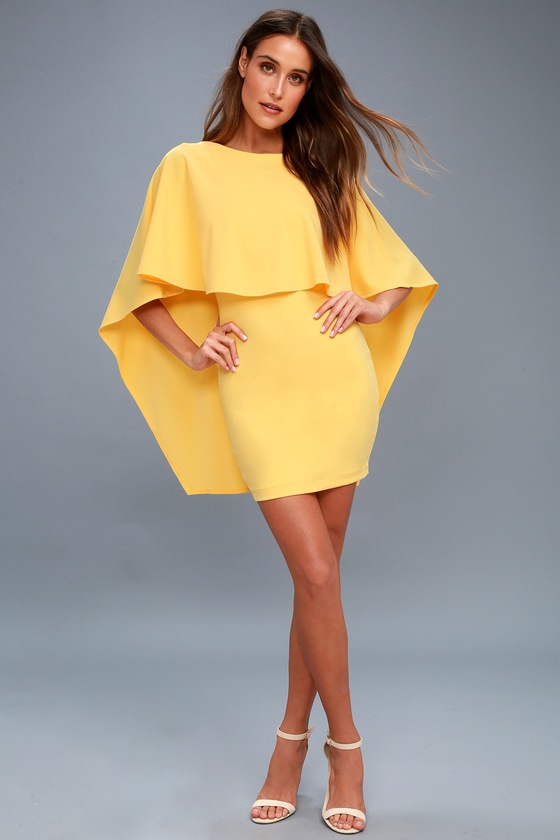 yellow dress with cape