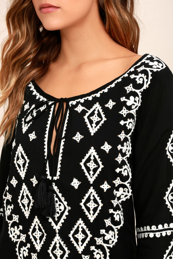black dress with white long sleeve