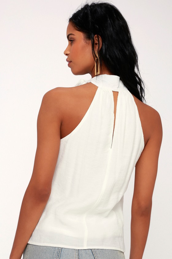 white sleeveless high neck top