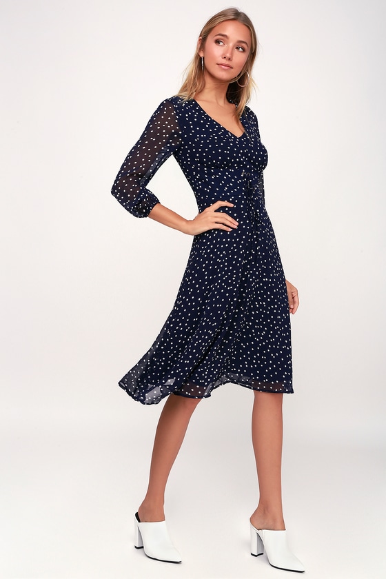 navy dress with white polka dots