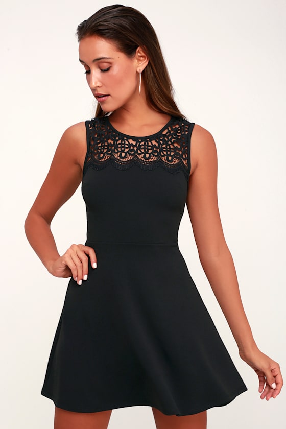 According to Love Black Lace Skater Dress - Let the Lulus According to Love Black Lace Skater Dress sweep you off your feet! The classic skater dress silhouette gets a flirty, feminine update with lovely crochet lace that shapes an illusion neckline atop a fitted, darted bodice. The lightweight woven composition continues into a fitted waist and a chic skater skirt that falls to a flirty length. Hidden back zipper.