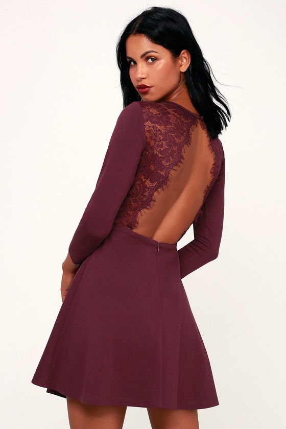 Felicity Plum Purple Backless Lace Skater Dress - Lulus Exclusive! Sing, dance, and smile the night away in the Lulus Felicity Plum Purple Backless Lace Skater Dress! Medium-weight, stretch woven fabric dances from a rounded neckline into a fitted darted bodice framed by fitted three-quarter length sleeves. A fitted waist tops a classic skater skirt. The details don't stop there! Lovely eyelash lace frames a backless design with a top button closure and a hidden zipper/clasp. Loving this backless look for homecoming? If thereโ€™s one thing we know, itโ€™s that an open back dress is a certified head-turner! Try a dress with back appeal to take your look to the next level. For more must-read styling tips, take a peek at our Homecoming Buying Guide!