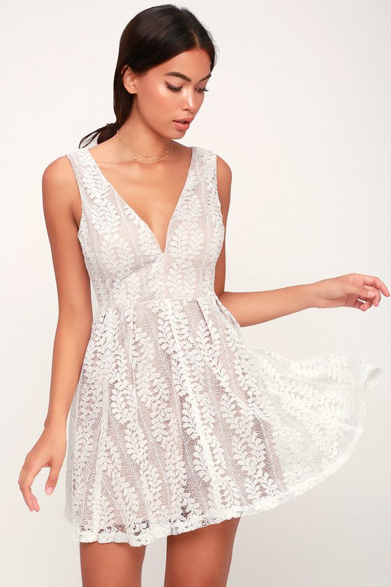 All of My Heart White Lace Skater Dress - Lulus Exclusive! Give your all on the dance floor in the Lulus All of My Heart White Lace Skater Dress! Lovely sheer lace, over nude knit lining, falls from tank straps, into a plunging V-neckline, with hidden V-bar, and darted bodice. Fitted waist sits above a flaring, full skater skirt. Hidden back zipper/clasp.
