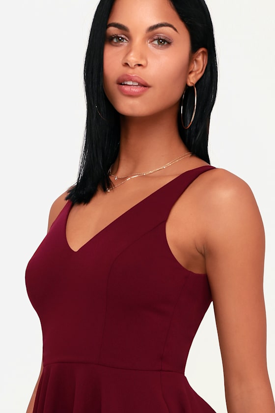 Ariana Burgundy Skater Dress - Lulus Exclusive! Get the party started in the Lulus Ariana Burgundy Skater Dress! This thick stretch knit dress has a fitted bodice with princess seams and deep V-neckline. The party perfect look is finished by a flirty skater skirt with hidden side seam pockets. Wide straps support a V-back with hidden zipper/clasp at back.