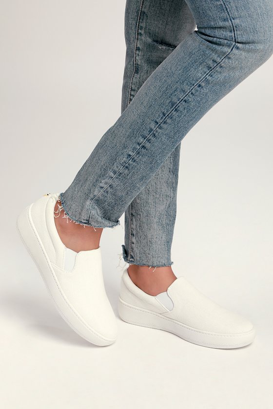 white canvas lace up flatform trainers