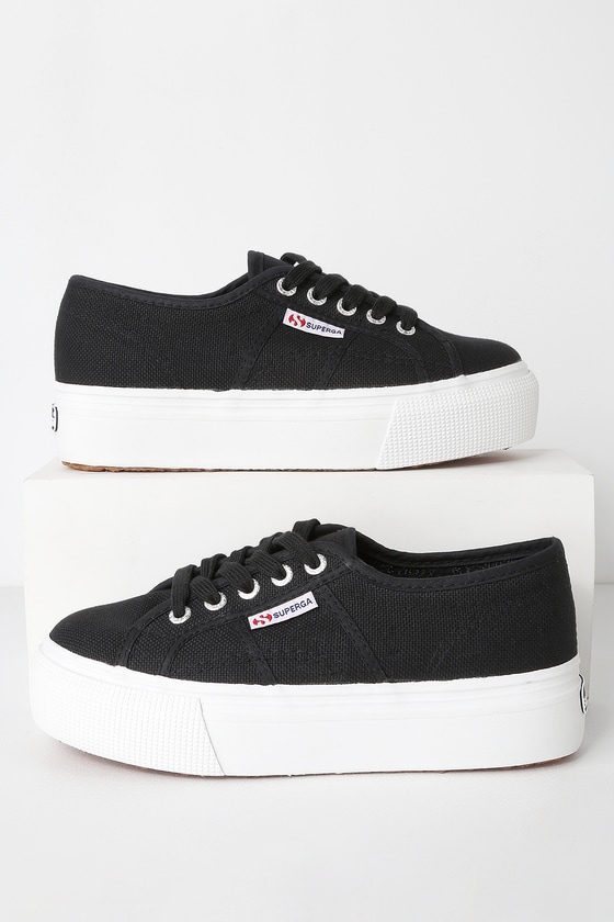 white and black platform sneakers