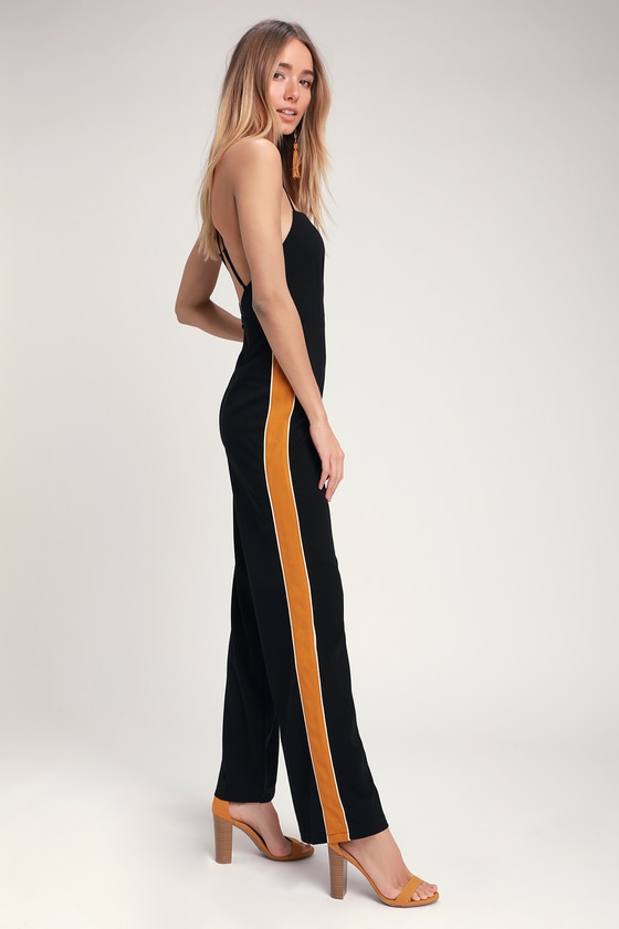 yellow jumpsuit with black stripe