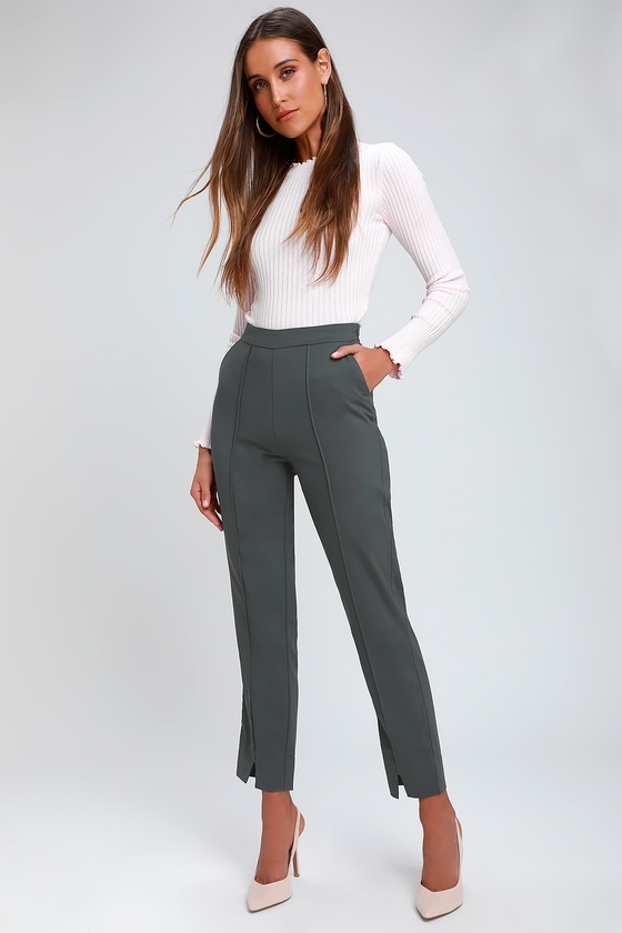 grey trouser and black shirt