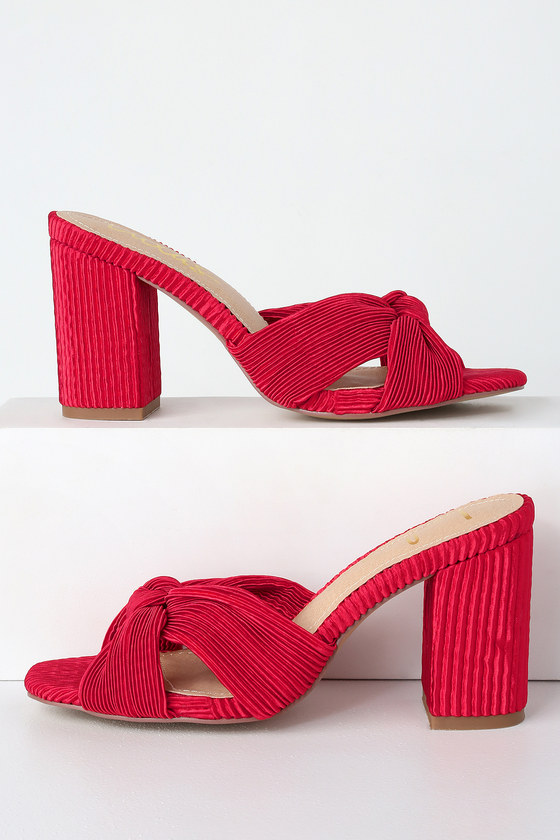 red sandals with tassels