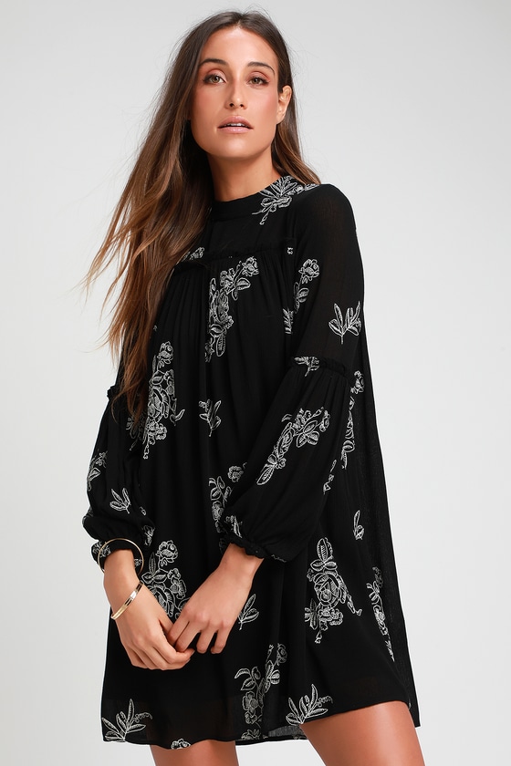 white dress with black embroidery