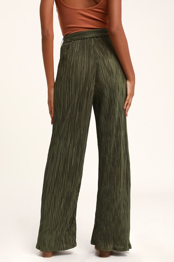 black top olive green pants