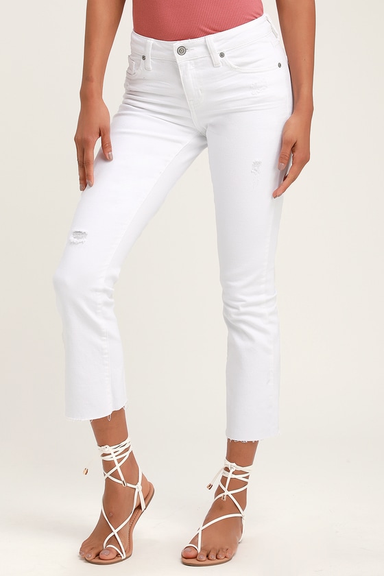 white distressed capri jeans