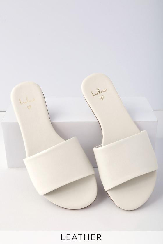 white leather slides