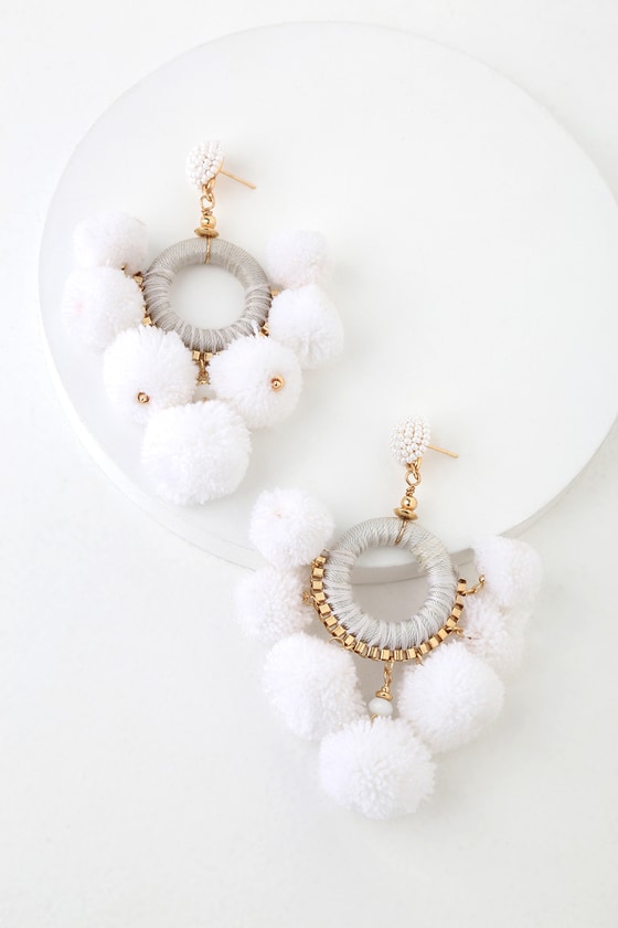 white pom pom earrings