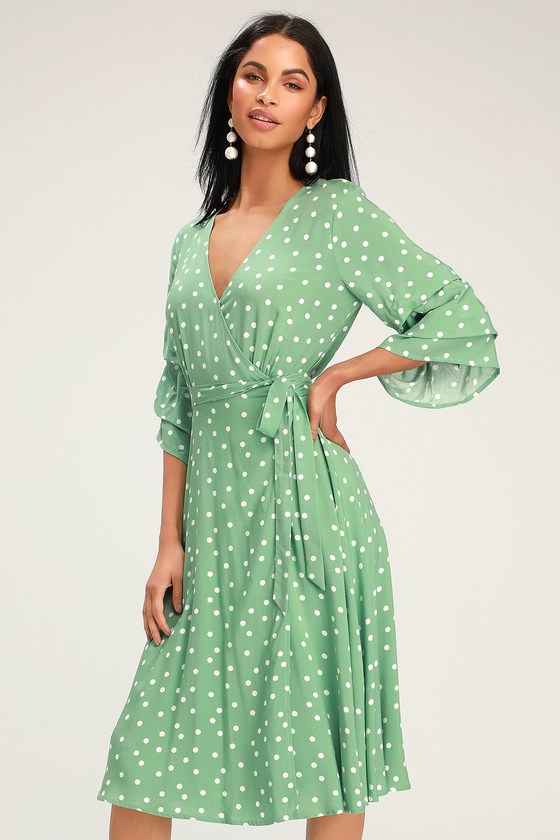 green dress with white polka dots