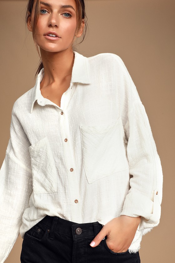 white button up under crew neck