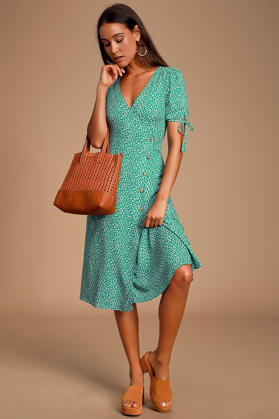 white dress with green leaf print
