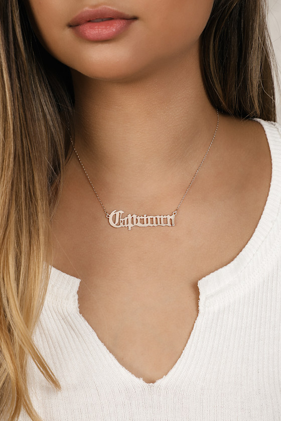 In Retrograde Gold Capricorn Script Zodiac Necklace 1