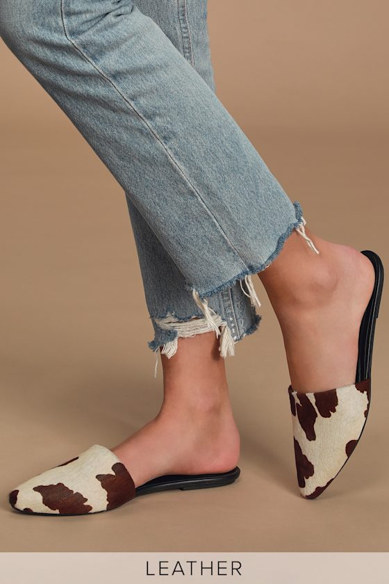 cow print fluffy slides