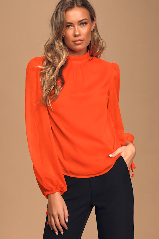 orange mock neck top