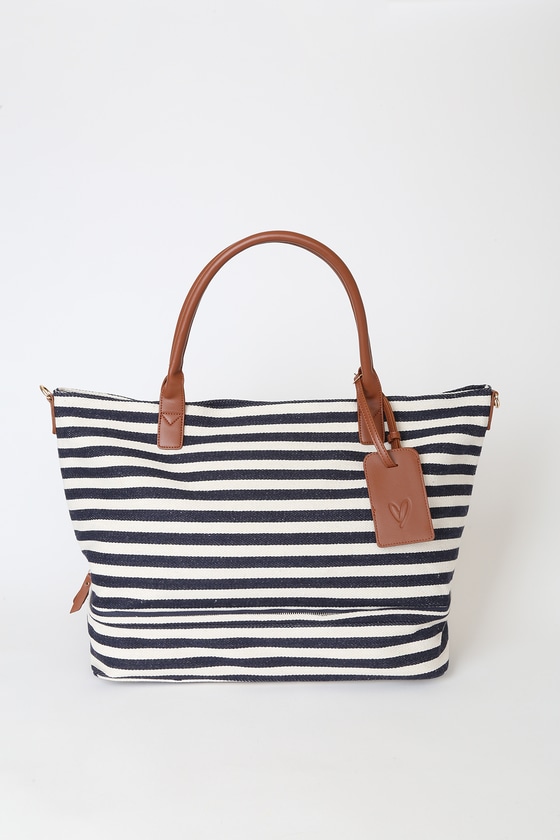 navy and cream bag