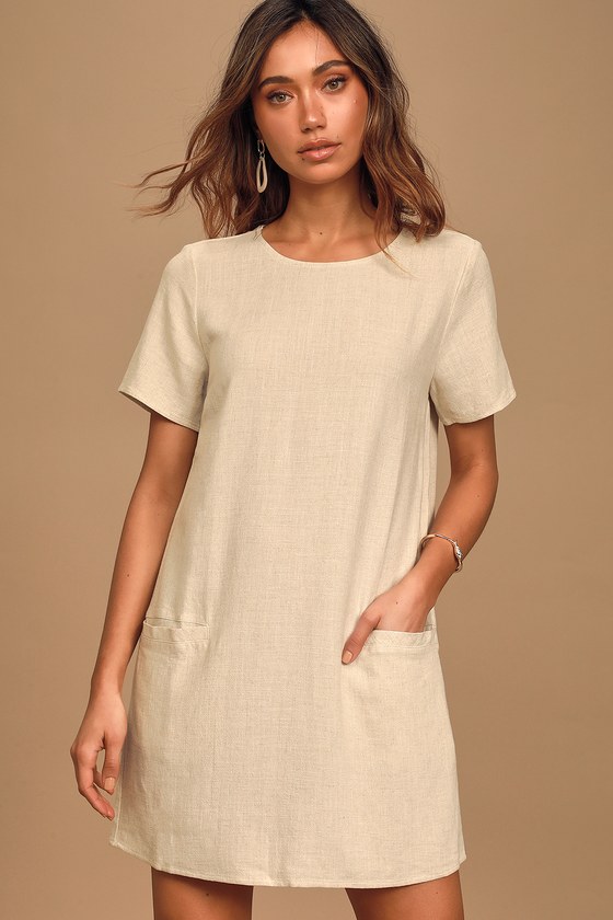 beige shift dress with sleeves