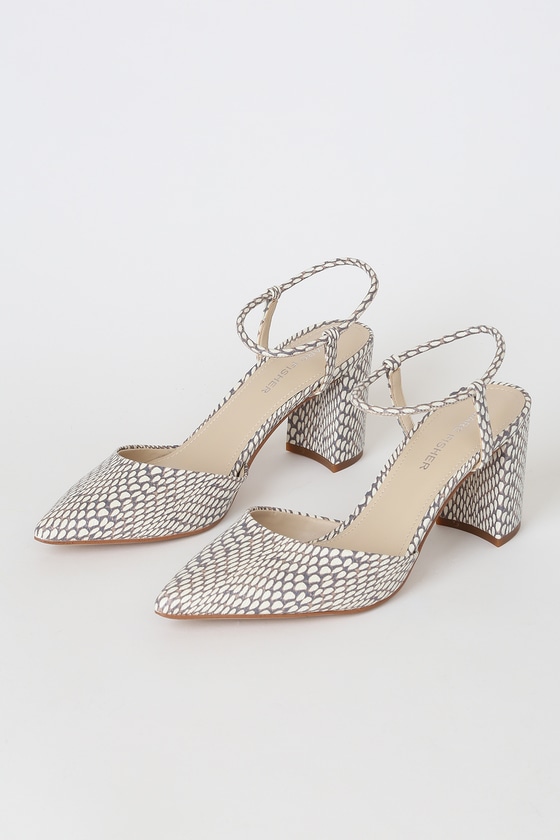 snake print pointed heels