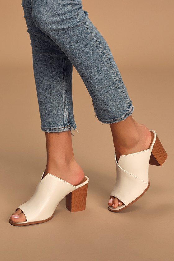 white open toe heeled mules