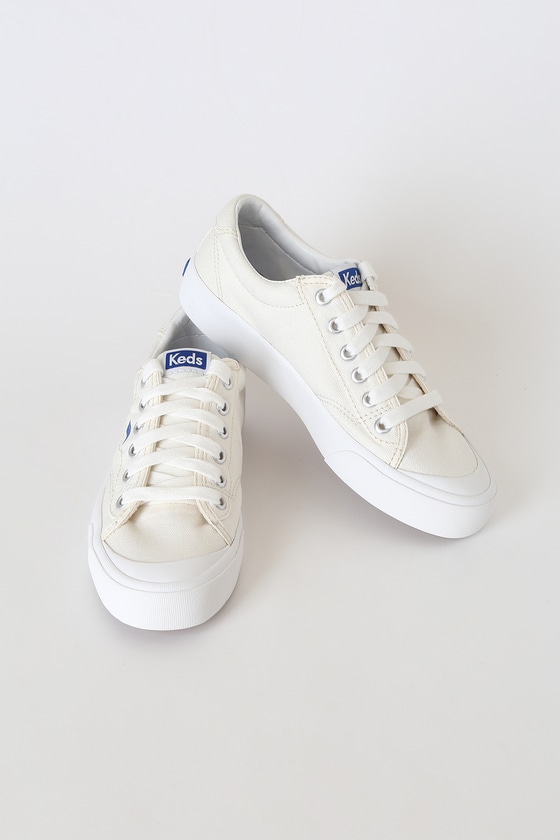 white canvas platform trainers