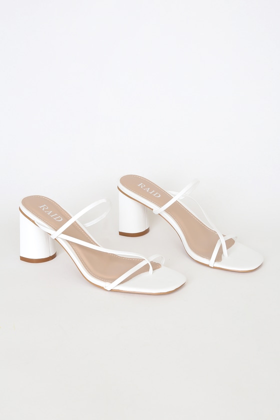 white strappy flip flops