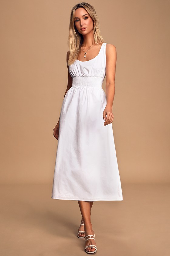 white sleeveless cotton dress