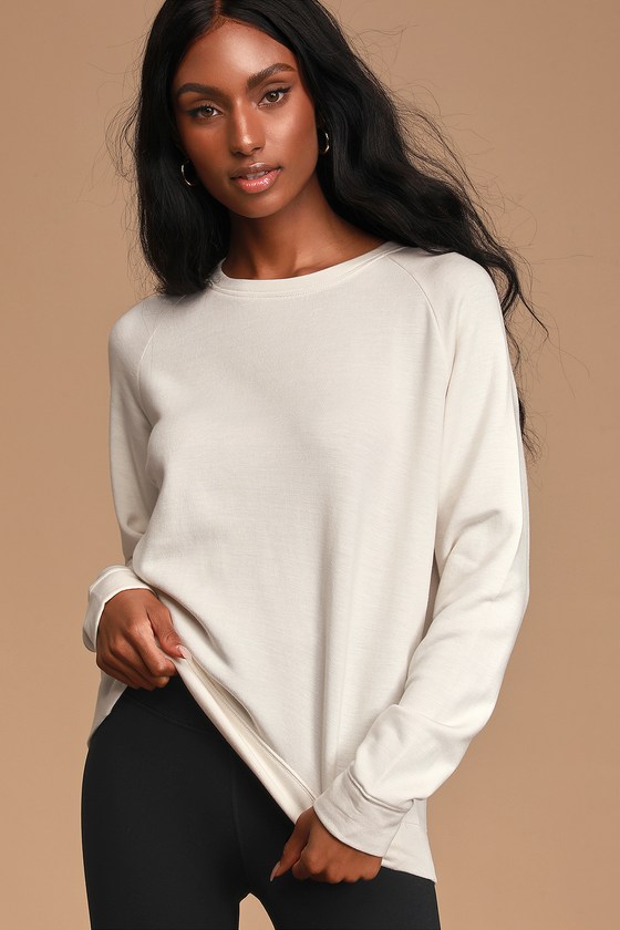 cream sweatshirt and joggers