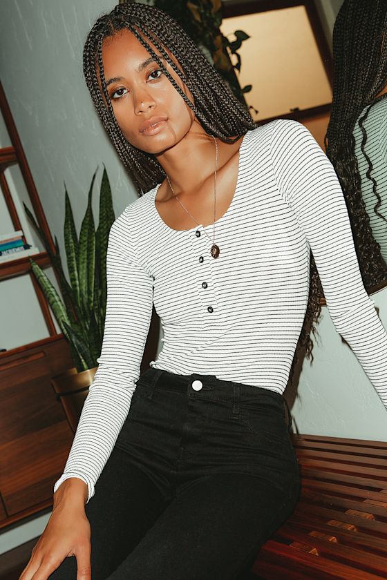 That's a Classic White Striped Ribbed Long Sleeve Bodysuit 6
