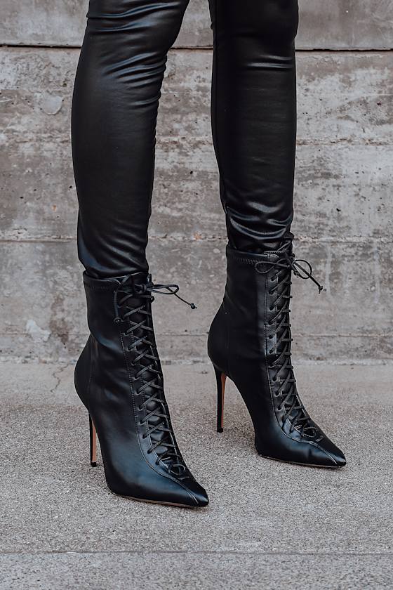 black pointed toe lace up boots