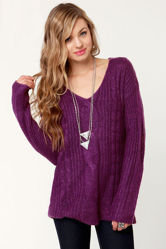 purple and yellow sweater
