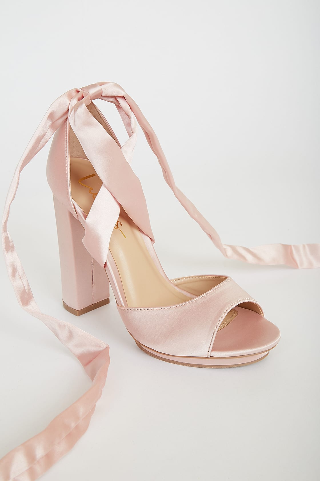 Blush pink lace-up heels
